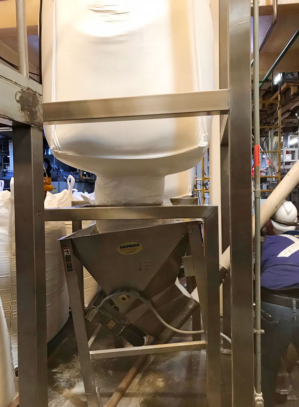 cornmeal chute for dry powder transfer at large bakery company